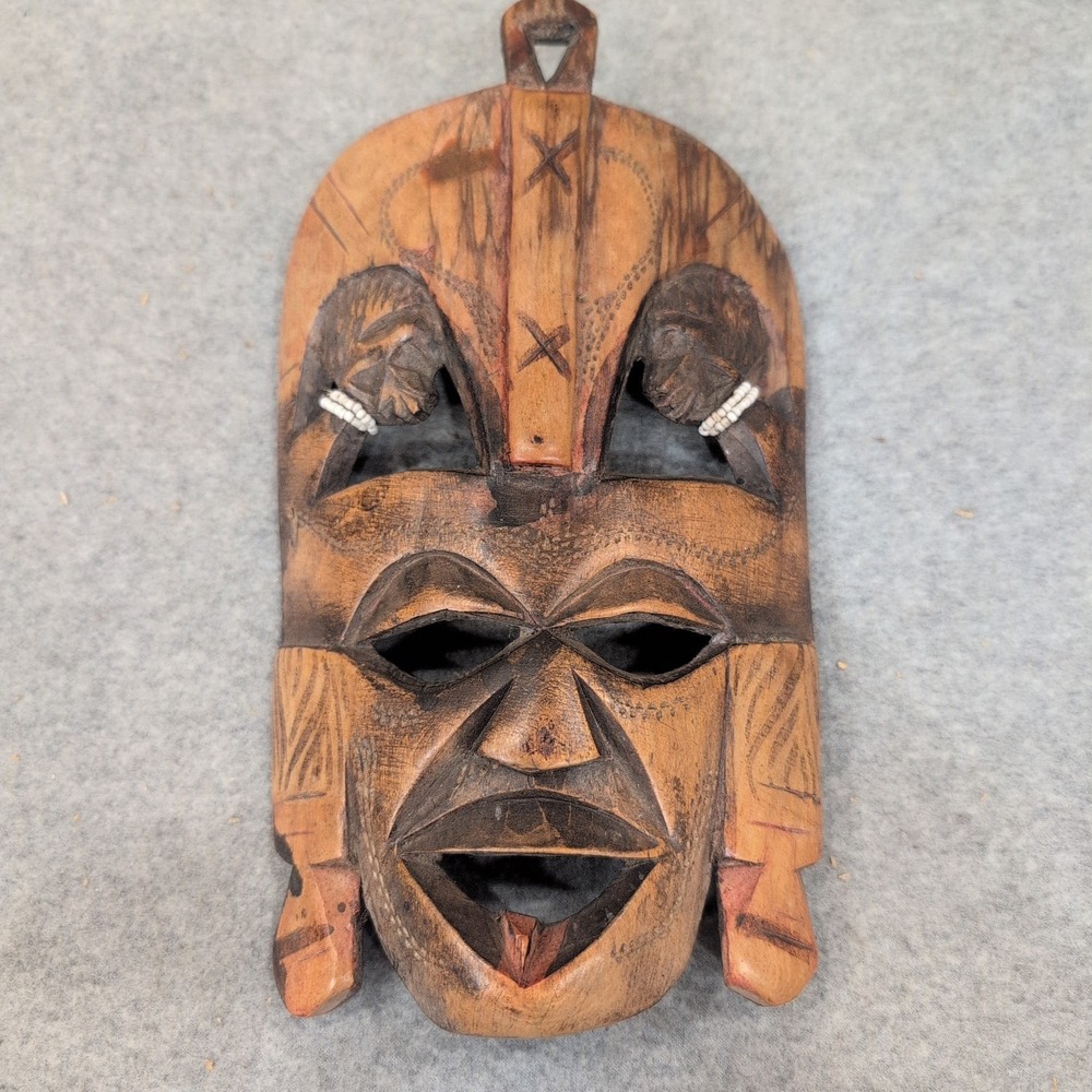 Hand Carved Wooden Tribal Wall Mask with White Bead Accents Brown Decor